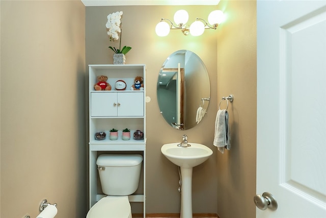 bathroom featuring toilet