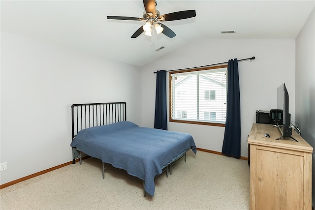 bedroom featuring lofted ceiling, light colored carpet, and ceiling fan