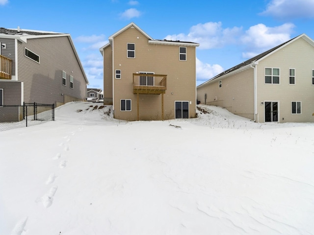 view of snow covered house