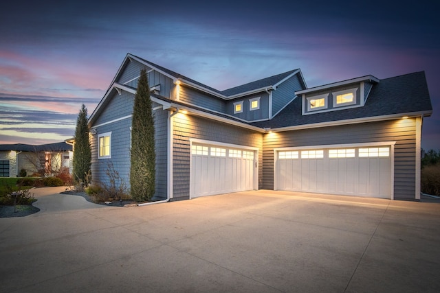 view of front of home with a garage