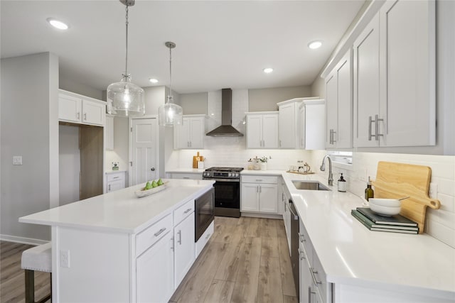 885 NW Frescott Cir, Waukee, IA 50263 - kitchen with wall chimney exhaust hood, a sink, appliances with stainless steel finishes, a kitchen island, and tasteful backsplash