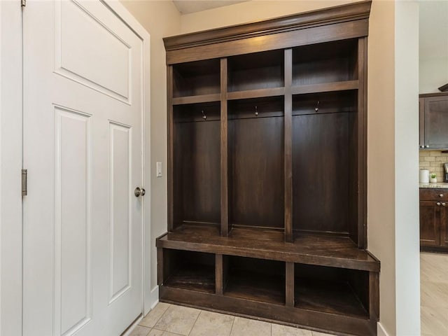 mudroom with light tile patterned flooring