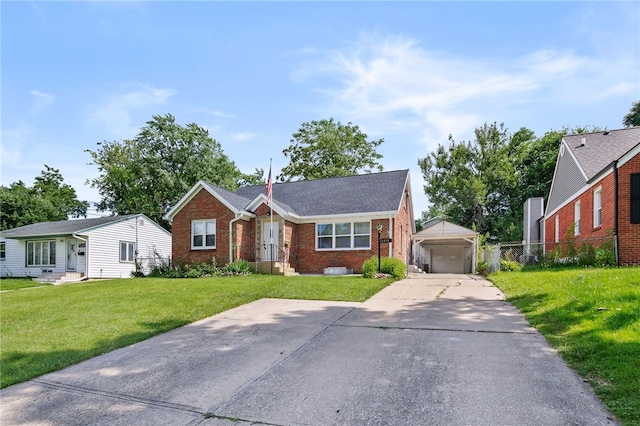 view of front of house with a garage, an outdoor structure, and a front lawn