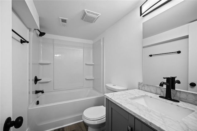 full bathroom with shower / washtub combination, toilet, wood-type flooring, and vanity