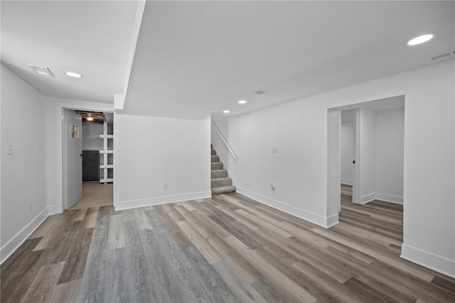 unfurnished living room featuring light hardwood / wood-style flooring