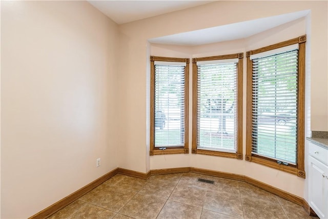 view of tiled empty room