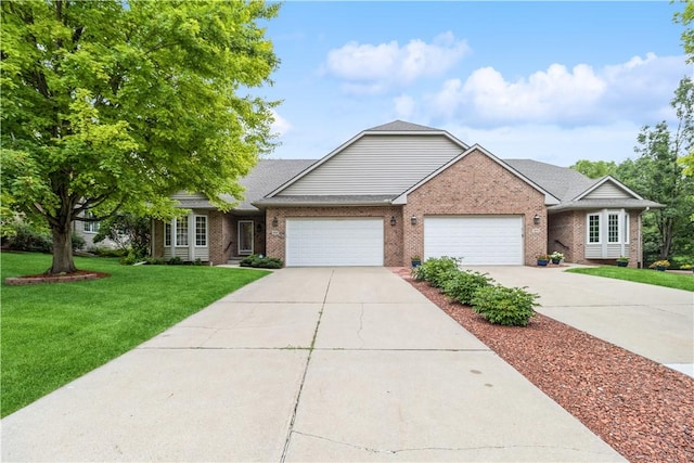 ranch-style house featuring a garage and a front yard