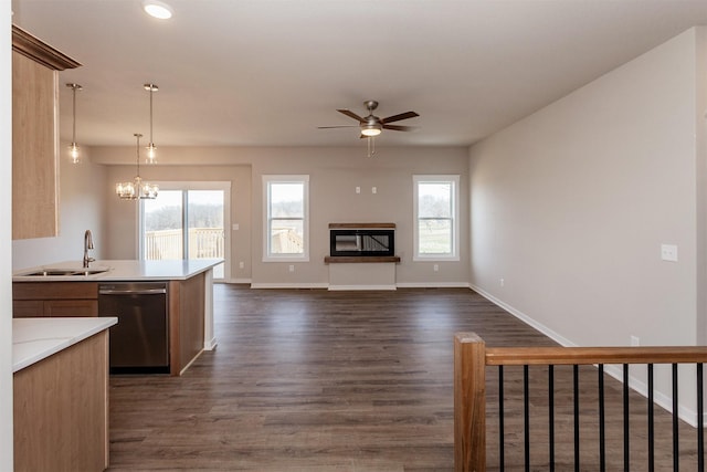 7807 SE 2nd St SE, Des Moines, IA 50320 - kitchen featuring dishwasher, dark wood-style floors, a ceiling fan, and plenty of natural light