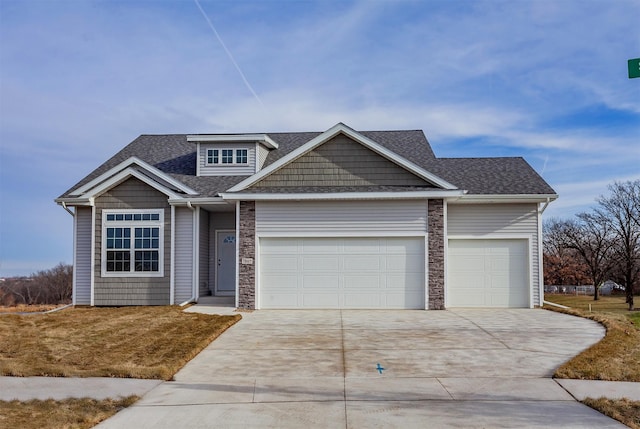 7807 SE 2nd St SE, Des Moines, IA 50320 - craftsman inspired home with a garage, concrete driveway, and a shingled roof