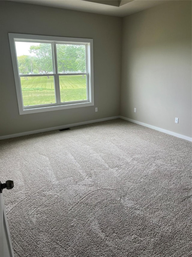 7807 SE 2nd St SE, Des Moines, IA 50320 - carpeted spare room featuring baseboards