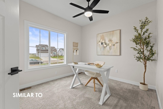 home office featuring carpet floors and ceiling fan