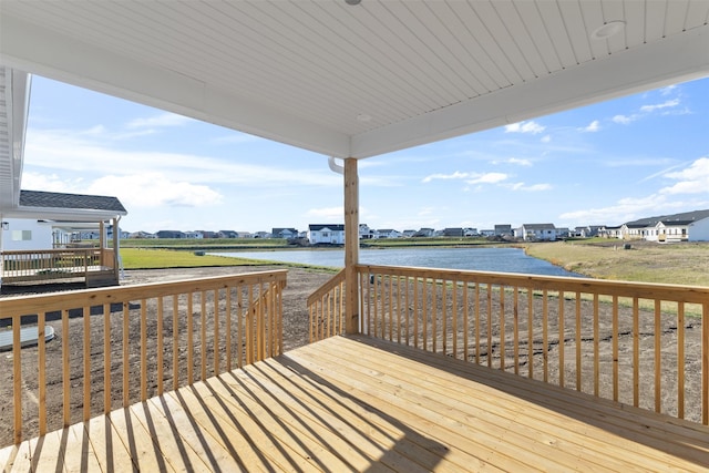 deck featuring a water view