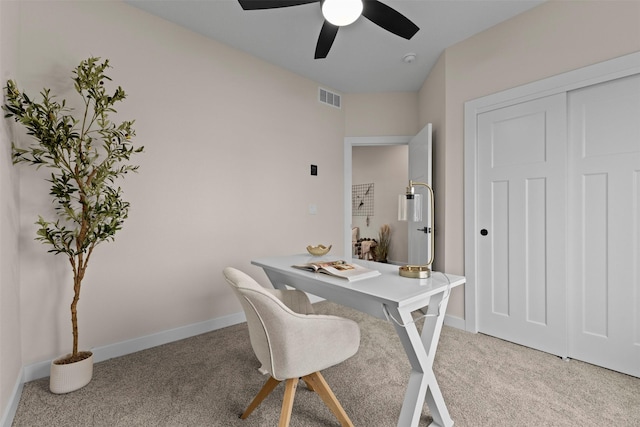 office area featuring carpet floors and ceiling fan