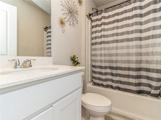 full bath with toilet, shower / tub combo with curtain, and vanity