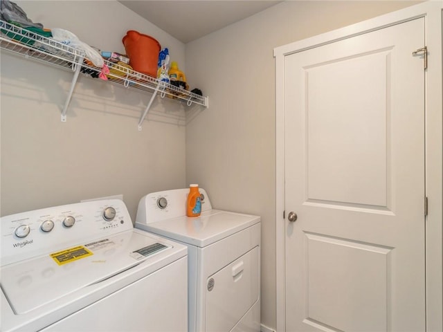 laundry area featuring washer and dryer and laundry area