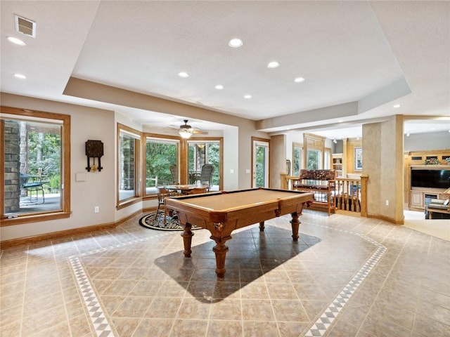 playroom featuring a raised ceiling, ceiling fan, light tile patterned floors, and billiards