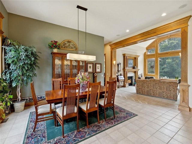 dining space with light tile patterned floors