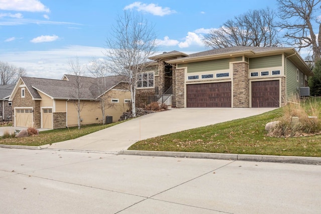 prairie-style home featuring central air condition unit