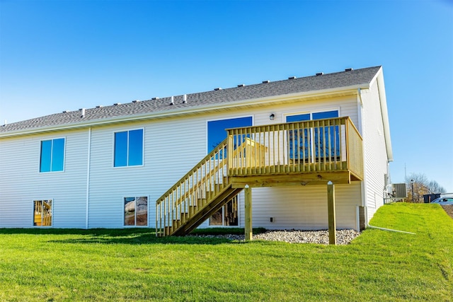6570 NE 11th Ct, Des Moines, IA 50313 - rear view of house with stairs, a lawn, a deck, and central air condition unit
