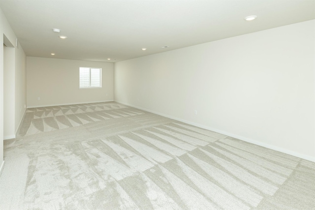 6573 NE 11th Ct, Des Moines, IA 50313 - unfurnished room featuring light carpet, recessed lighting, and baseboards