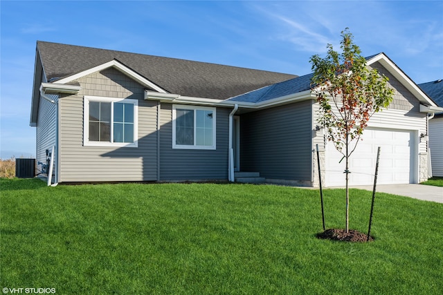 ranch-style house with central air condition unit, a front yard, and a garage