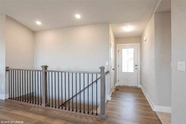 entryway featuring hardwood / wood-style floors and a textured ceiling