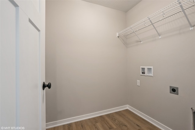 laundry area featuring washer hookup, hookup for an electric dryer, and dark hardwood / wood-style floors