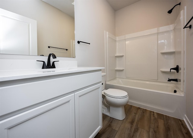 full bathroom featuring shower / tub combination, hardwood / wood-style floors, vanity, and toilet