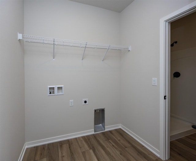 laundry area with electric dryer hookup, dark hardwood / wood-style flooring, and washer hookup