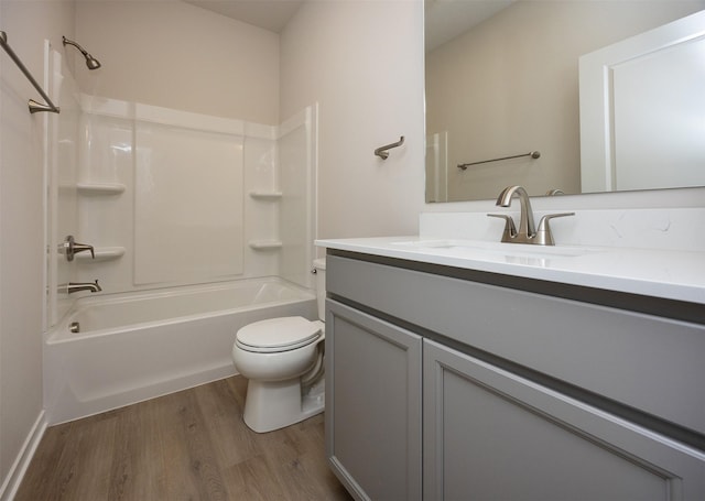 full bathroom with vanity, wood-type flooring,  shower combination, and toilet