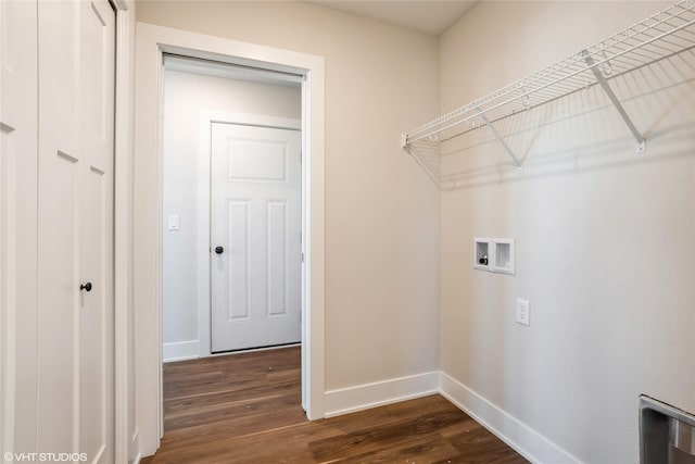 laundry room featuring dark hardwood / wood-style floors and hookup for a washing machine