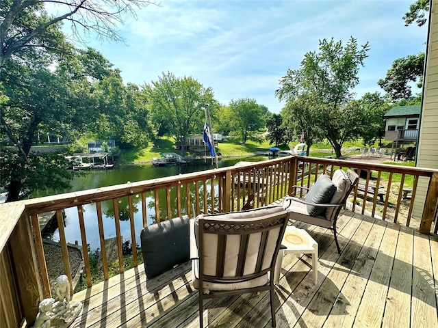 1126 Lakeshore Dr, Brooklyn, IA 52211 - wooden terrace with a water view and view of scattered trees