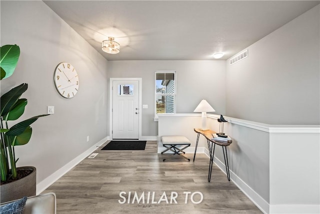 entrance foyer with hardwood / wood-style floors