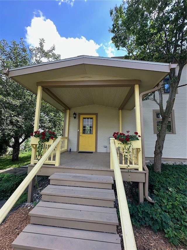 entrance to property with a porch