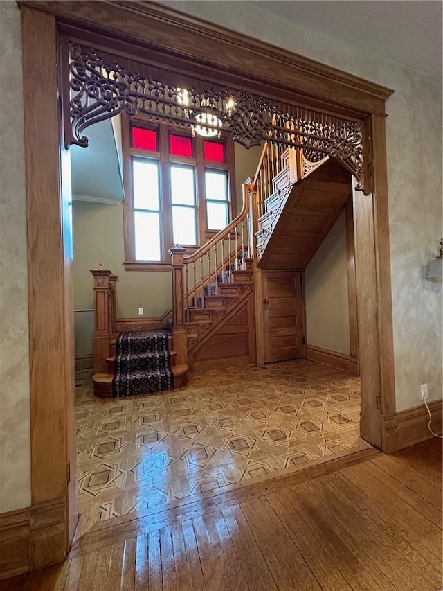 stairway featuring hardwood / wood-style flooring