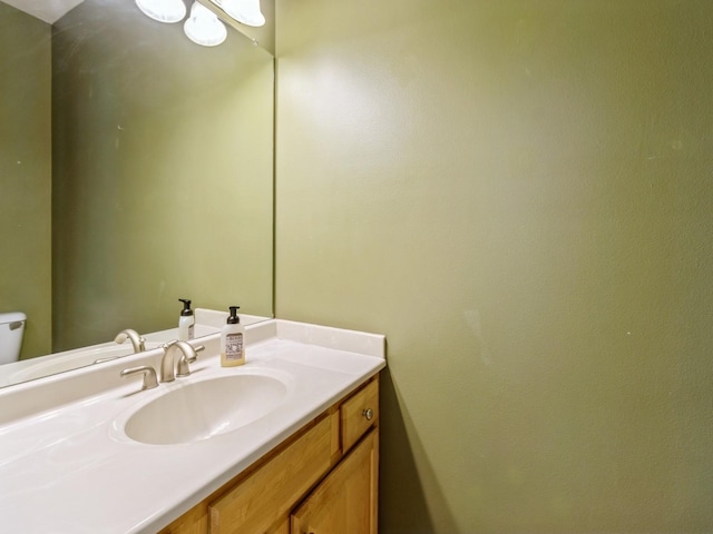 half bath with toilet and vanity