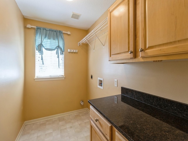 laundry room with baseboards, light floors, visible vents, and hookup for an electric dryer