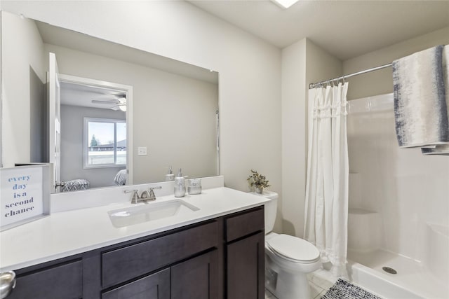 2925 3rd Ave SW, Altoona, IA 50009 - ensuite bathroom with vanity, toilet, a shower with curtain, ceiling fan, and tile patterned flooring