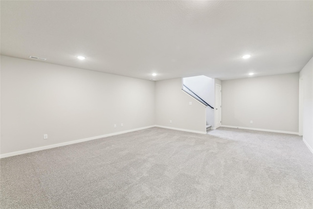 2925 3rd Ave SW, Altoona, IA 50009 - finished below grade area with stairway, recessed lighting, light carpet, and baseboards