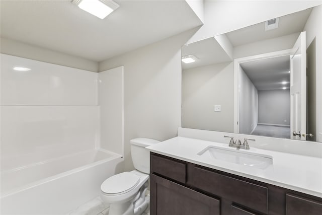 full bathroom featuring shower / washtub combination, vanity, and toilet