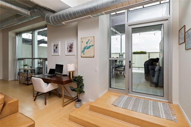 home office featuring light wood-type flooring