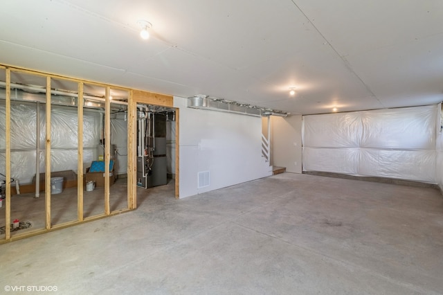 basement featuring heating unit