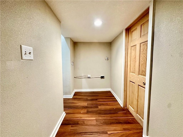 hallway featuring dark hardwood / wood-style floors