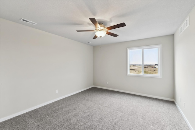 303 29th St SW, Altoona, IA 50009 - carpeted empty room with a ceiling fan and baseboards