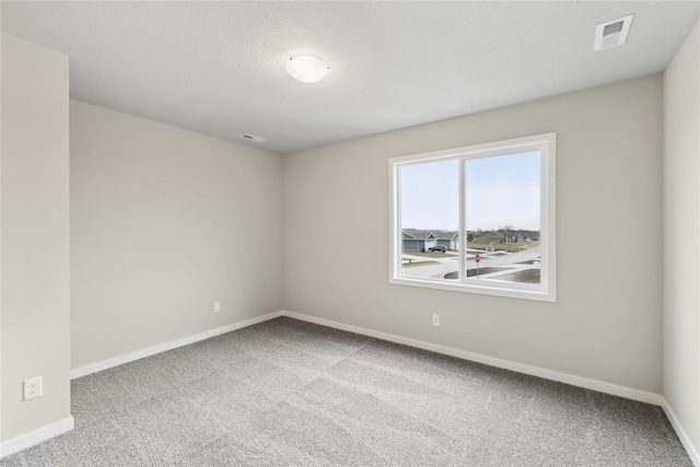 303 29th St SW, Altoona, IA 50009 - carpeted spare room featuring baseboards