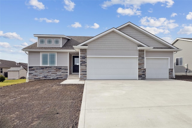 craftsman inspired home with a garage