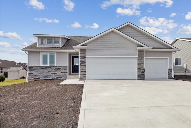 2920 3rd Ave SW, Altoona, IA 50009 - craftsman inspired home featuring stone siding, an attached garage, driveway, and a shingled roof