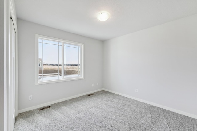 2920 3rd Ave SW, Altoona, IA 50009 - spare room with carpet flooring and baseboards