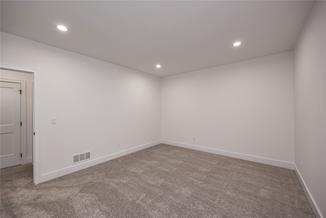 empty room with carpet flooring