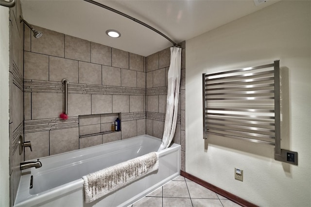 bathroom featuring shower / tub combo with curtain, radiator heating unit, and tile patterned flooring